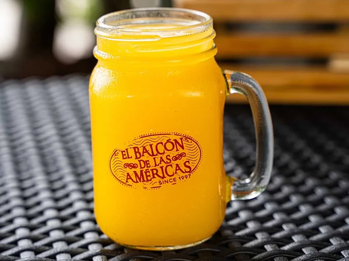 A glass of mango juice